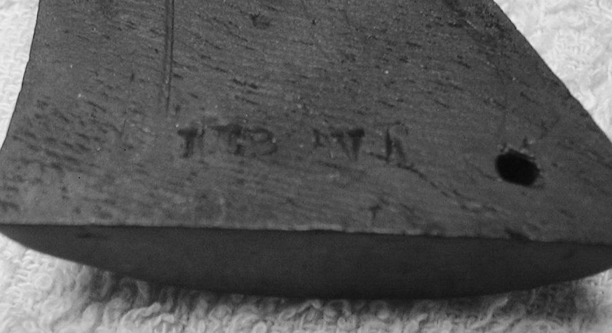 Inside the right grip. Stamped  JEB  VA<br />These are the initials of the man that owned it and I presume the VA stands for Verginia.