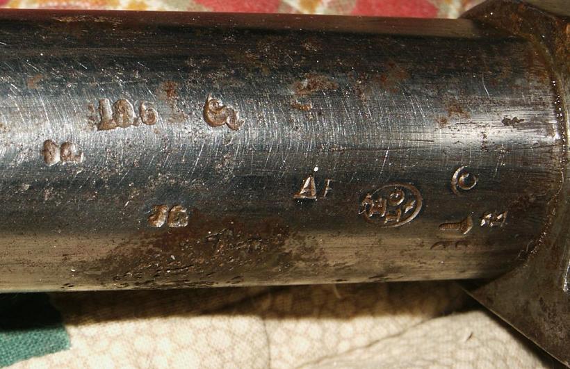 Proof marks under barrel
